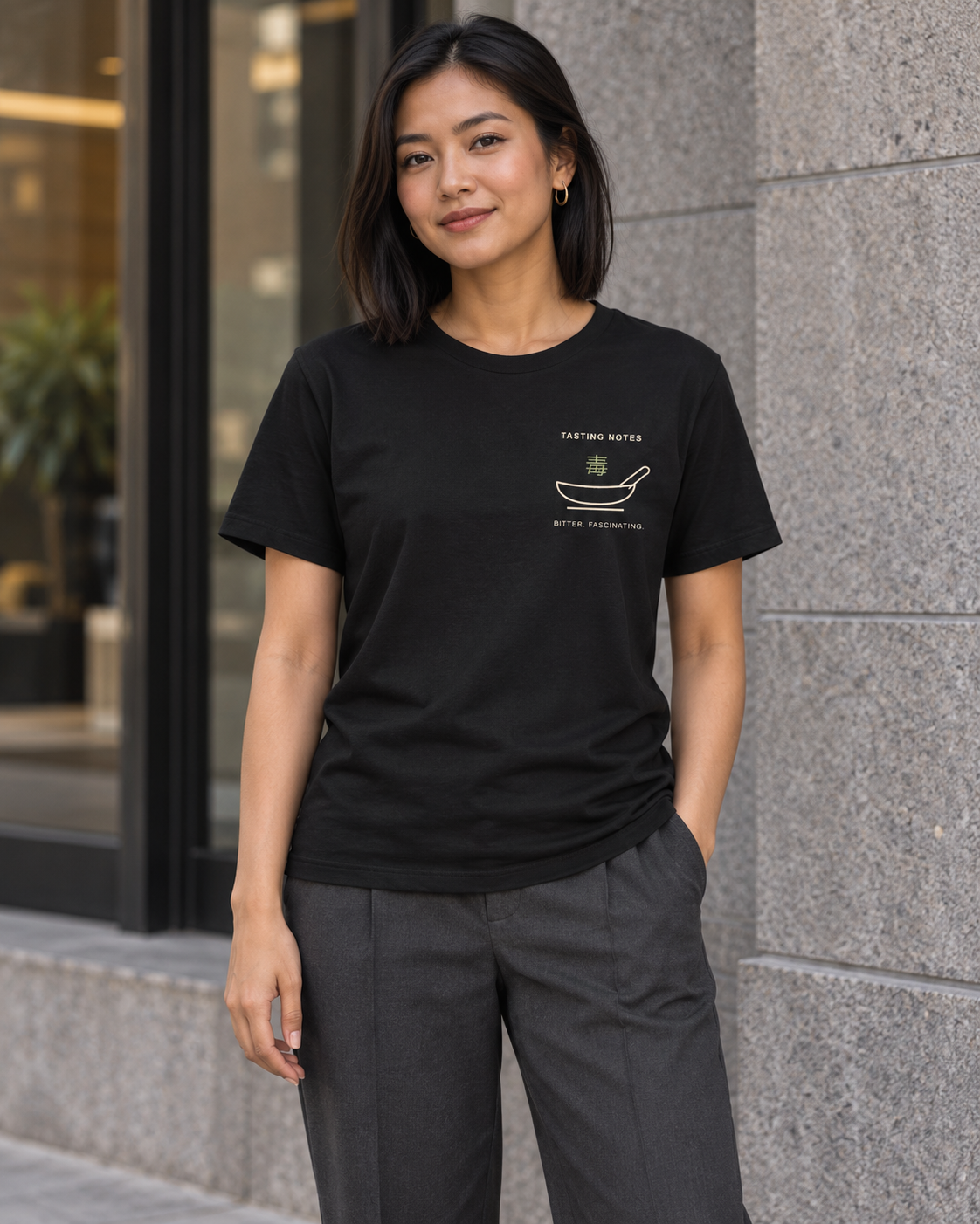 AI-generated lifestyle mockup of Tasting Notes Minimalist Anime Soft Tee in black on an adult model