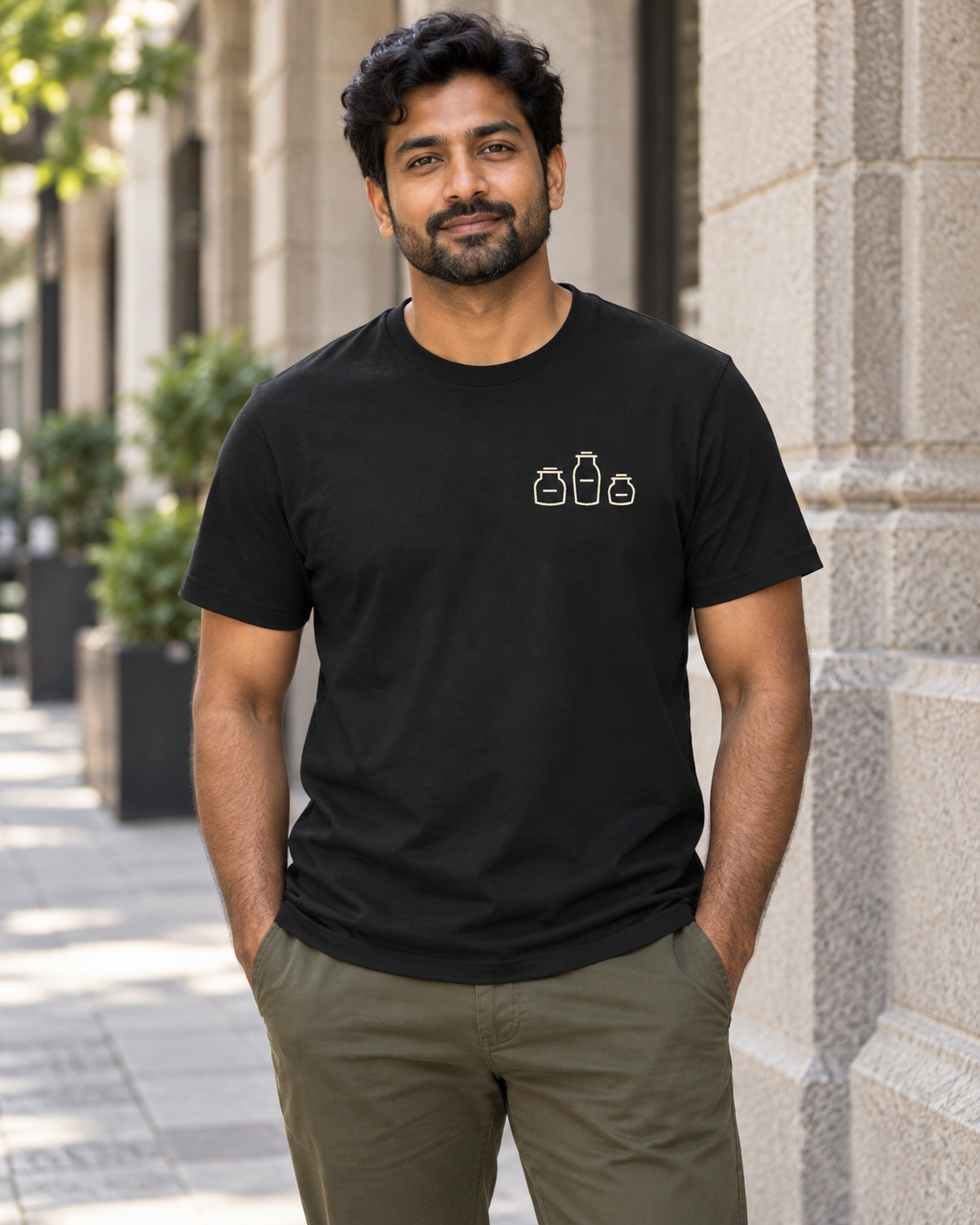 AI-generated lifestyle mockup of Measured Remedy Minimalist Anime Soft Tee in black on an adult model