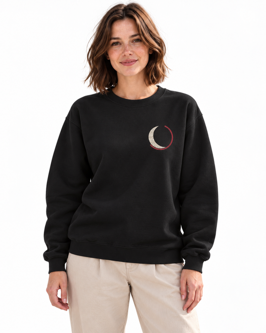 Black Moon Minimalist Crewneck Sweatshirt in Black — studio lifestyle front view