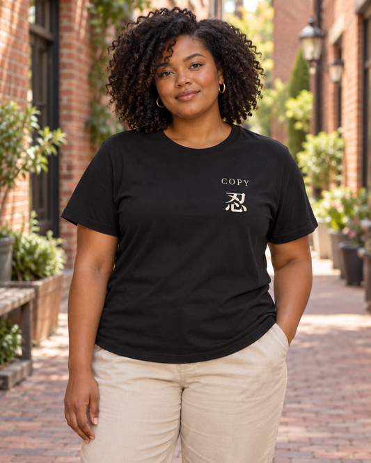 AI-generated lifestyle mockup of Copy Study Kanji Anime Soft Tee in black on an adult model