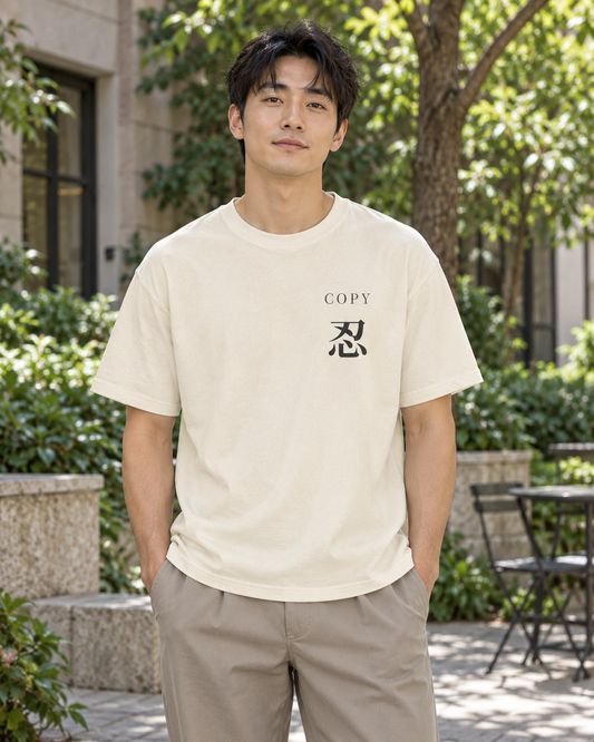 AI-generated lifestyle mockup of Copy Study Kanji Anime Tee in ivory on an adult model