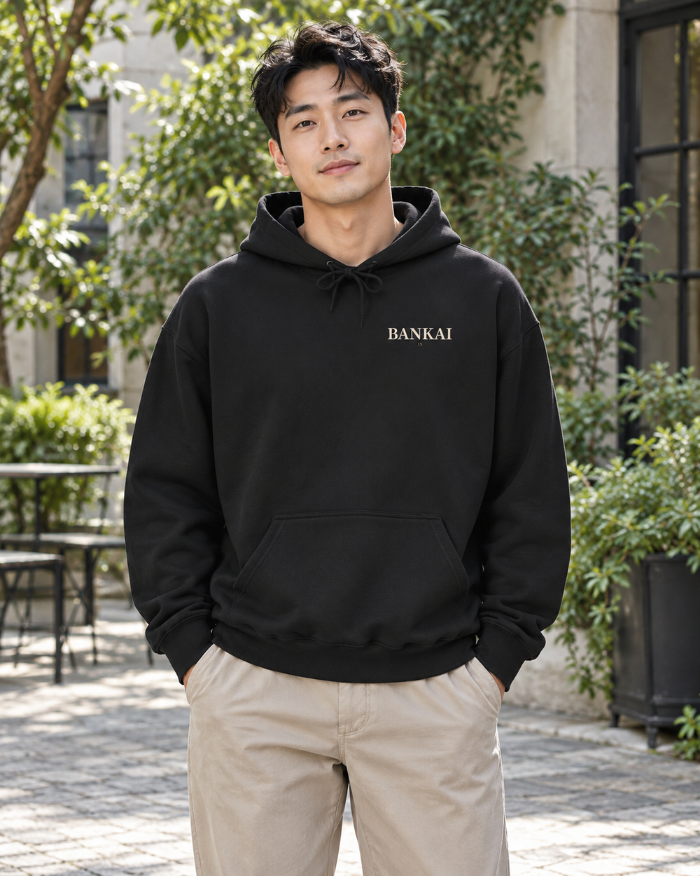 AI-generated lifestyle mockup of Final Release Quiet Edition Kanji Anime Hoodie in black on an adult model
