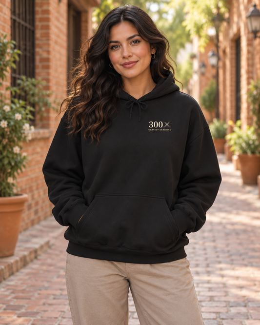AI-generated lifestyle mockup of Gravity Training Kanji Anime Hoodie in black on an adult model