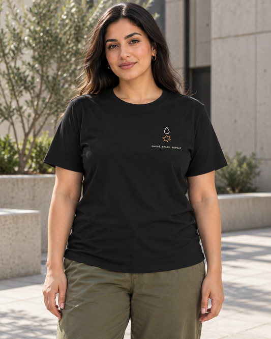 AI-generated lifestyle mockup of Ignition Routine Minimalist Anime Soft Tee in black on an adult model