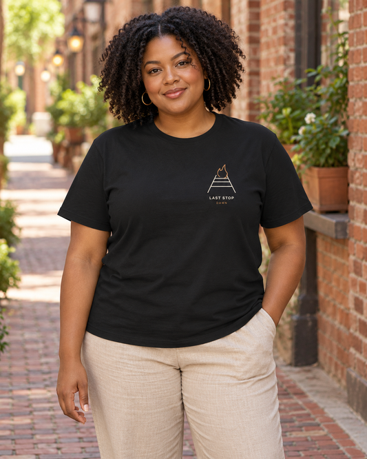 AI-generated lifestyle mockup of Last Stop Dawn Minimalist Anime Soft Tee in black on an adult model