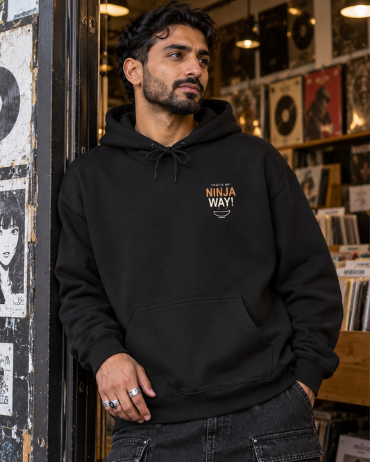 AI-generated lifestyle mockup of My Ninja Way Anime Quote Hoodie in black on an adult model