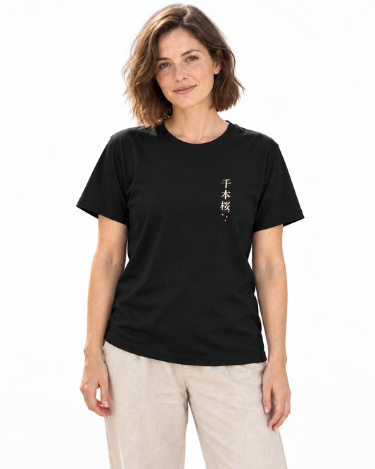Quiet Bloom Kanji Soft Tee in Black — studio lifestyle front view