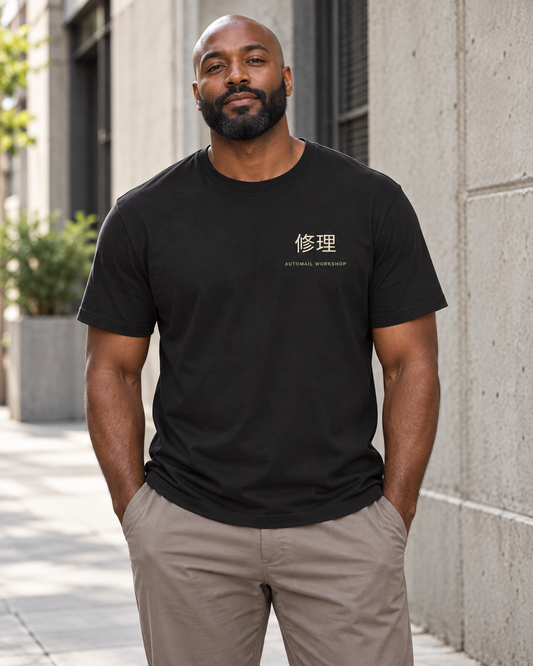 AI-generated lifestyle mockup of Rebuild Home Kanji Anime Soft Tee in black on an adult model