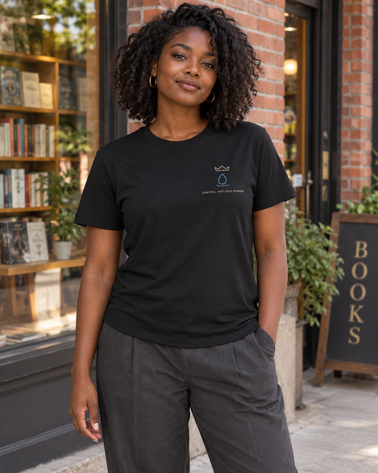 AI-generated lifestyle mockup of Royal Control Minimalist Anime Soft Tee in black on an adult model