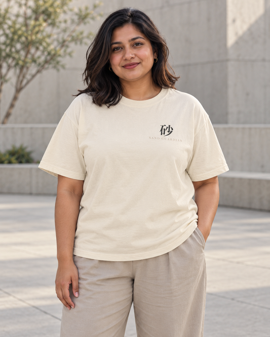 AI-generated lifestyle mockup of Sand Guardian Kanji Anime Tee in ivory on an adult model