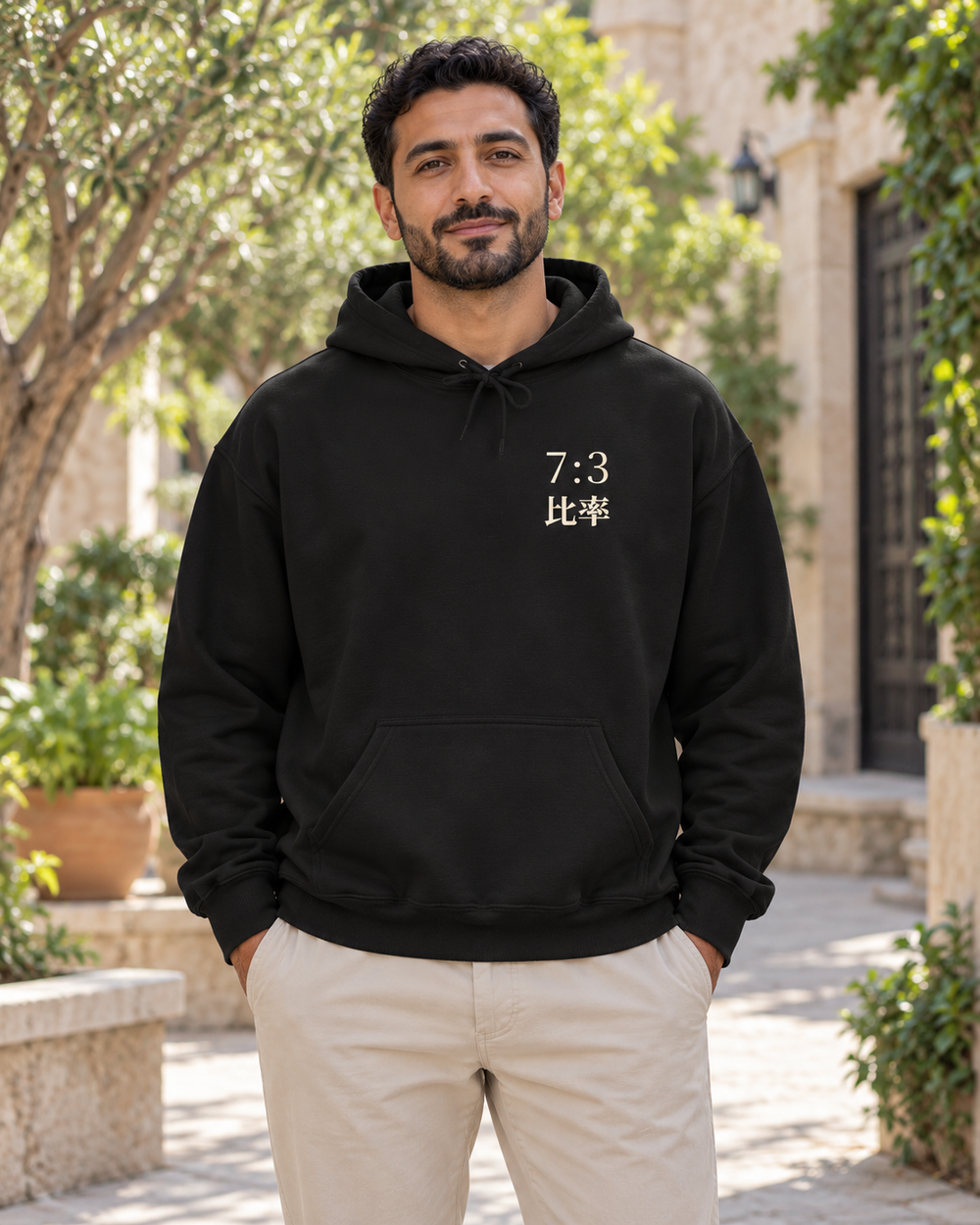 AI-generated lifestyle mockup of Seven Three Kanji Anime Hoodie in black on an adult model