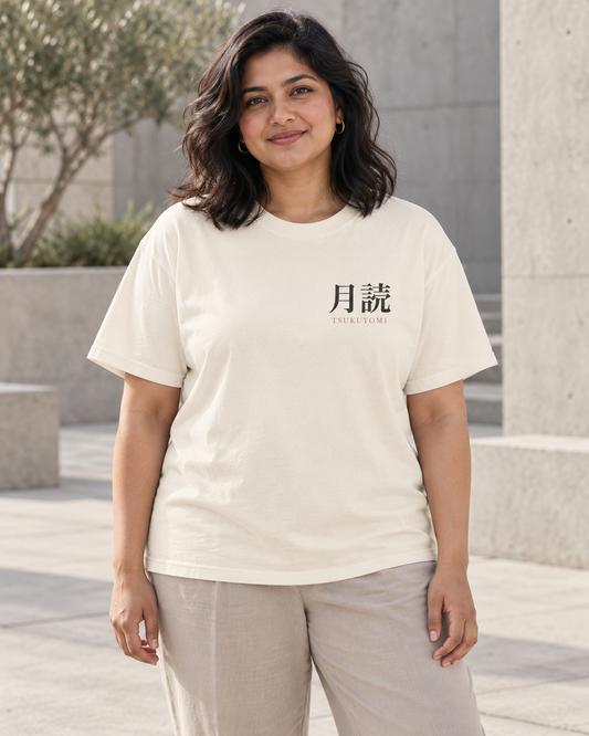 AI-generated lifestyle mockup of Silent Moon Kanji Anime Tee in ivory on an adult model