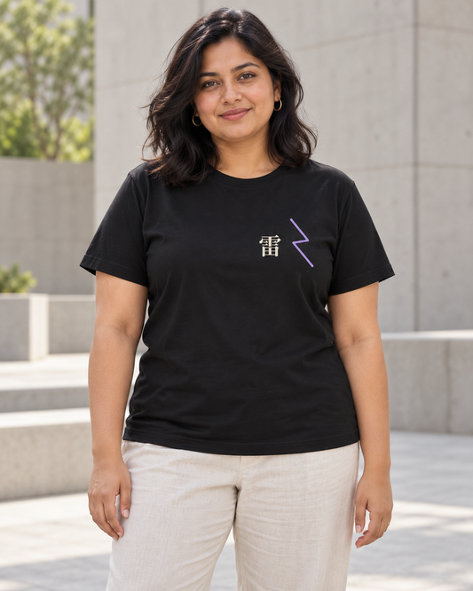 AI-generated lifestyle mockup of Storm Flame Kanji Anime Soft Tee in black on an adult model