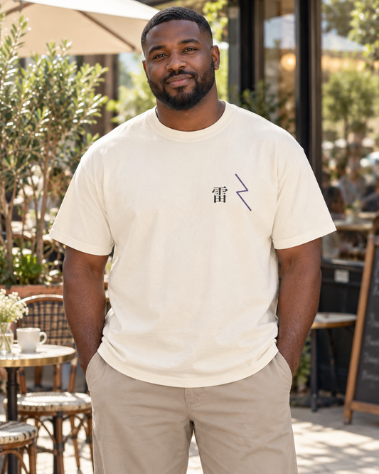 AI-generated lifestyle mockup of Storm Flame Kanji Anime Tee in ivory on an adult model