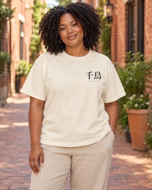 AI-generated lifestyle mockup of Storm Heir Kanji Anime Tee in ivory on an adult model