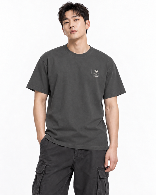 Shinobi Minimalist Anime Tee | Ninja Kanji Japanese Streetwear Shirt — front view — studio lifestyle